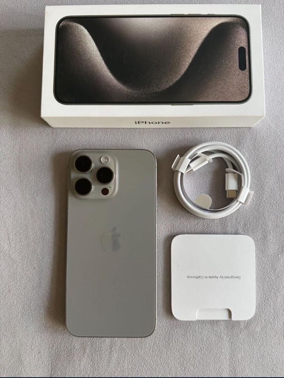 I phone 15 Pro Max T-Mobile Forged in titanium,