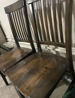 Two Dark Wood Spindle Back Dining Chair