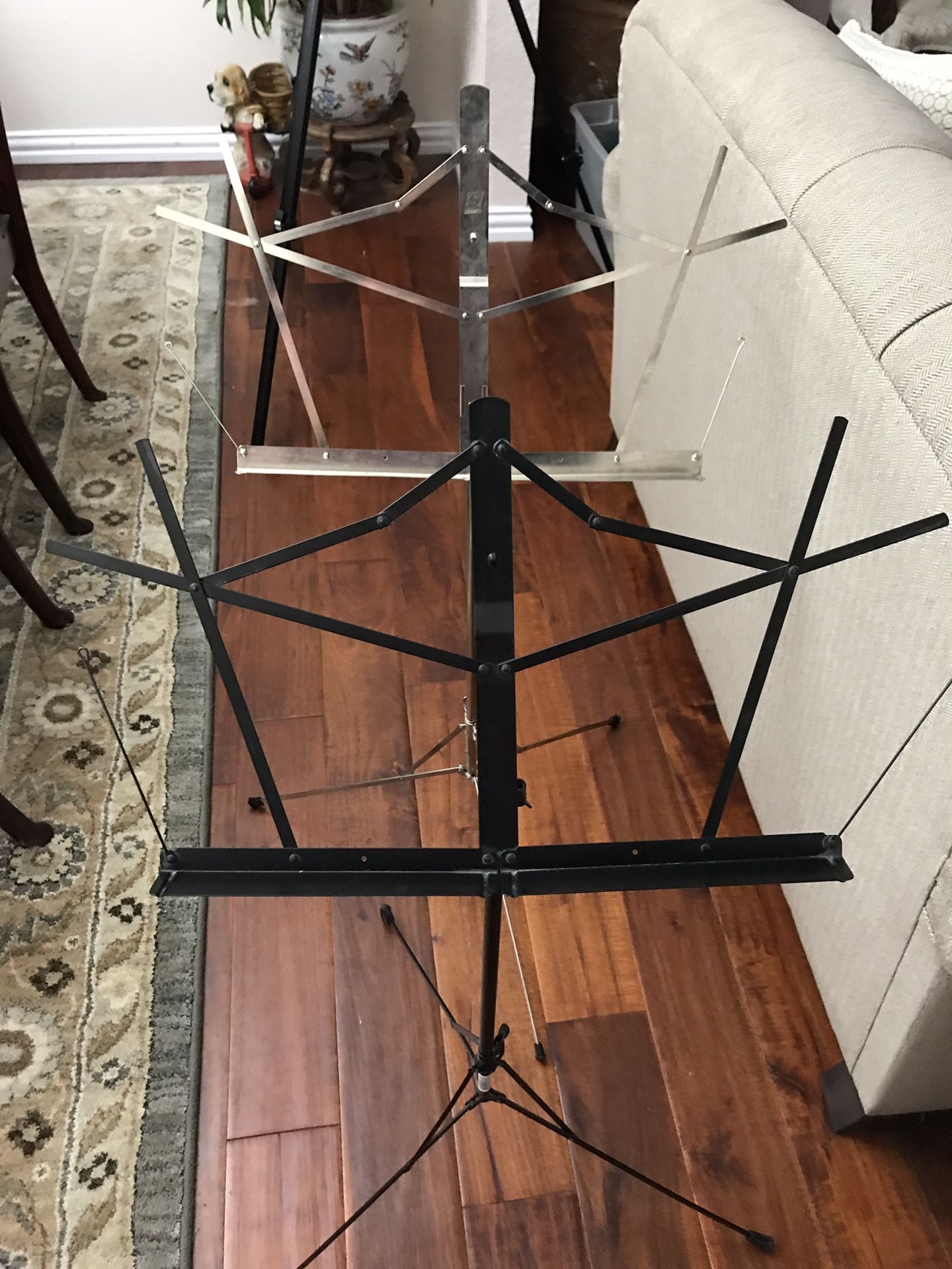 2 Music stands / black with bag and stainless with no bag