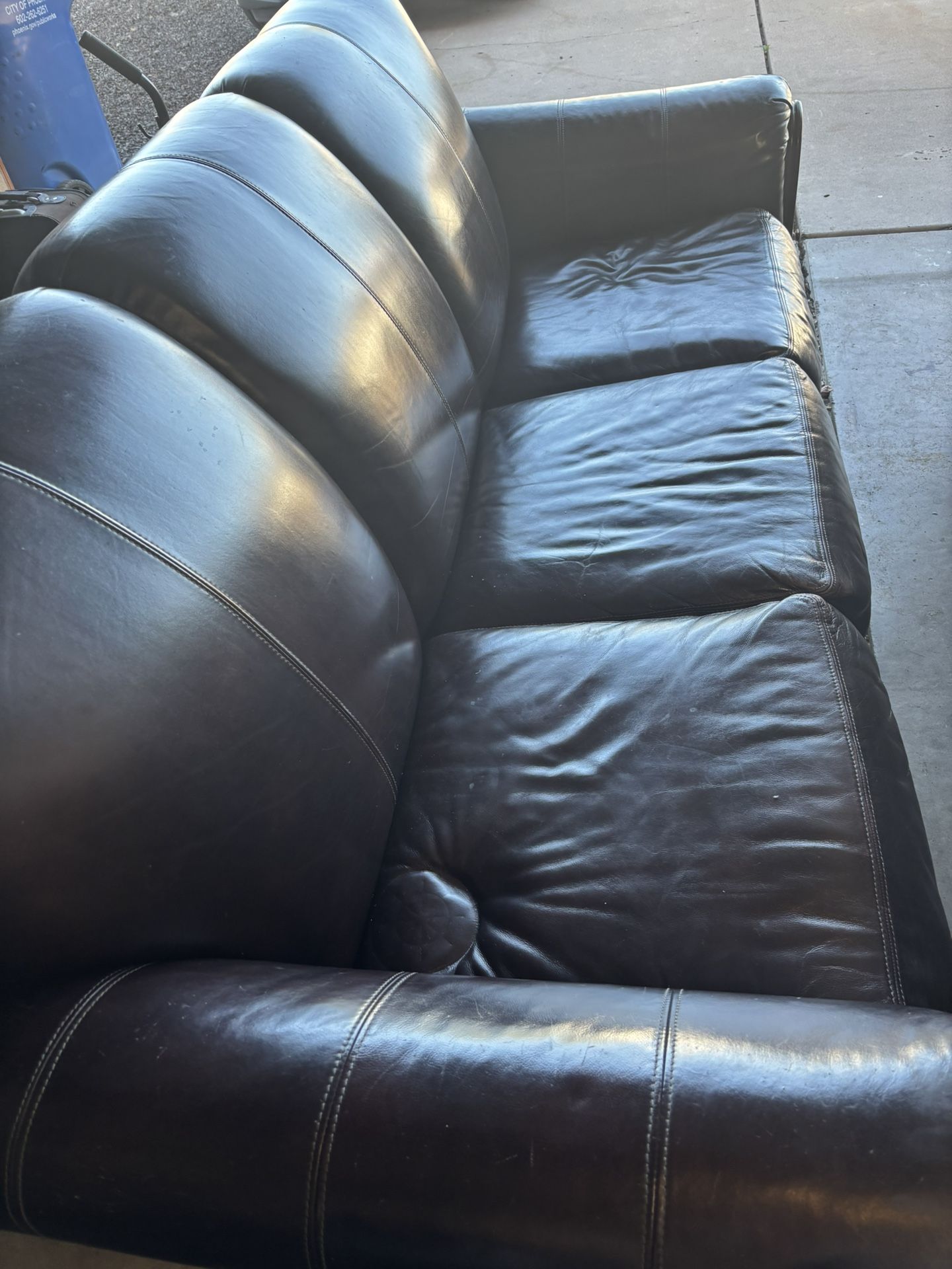A Pair Of Leather Couches 