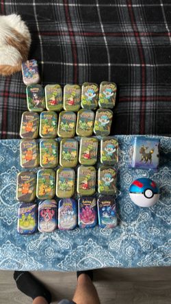 Lot of empty Pokémon tins