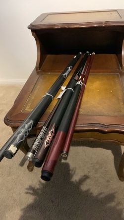Assorted pool sticks