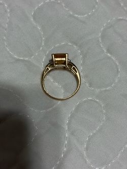 Gold Ring with Yellow Stone and Side Accents