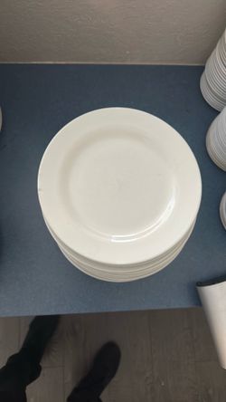 white porcelain round plates