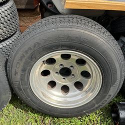 2 trailer Tires, Five Lug Aluminum Frame Like New Tires