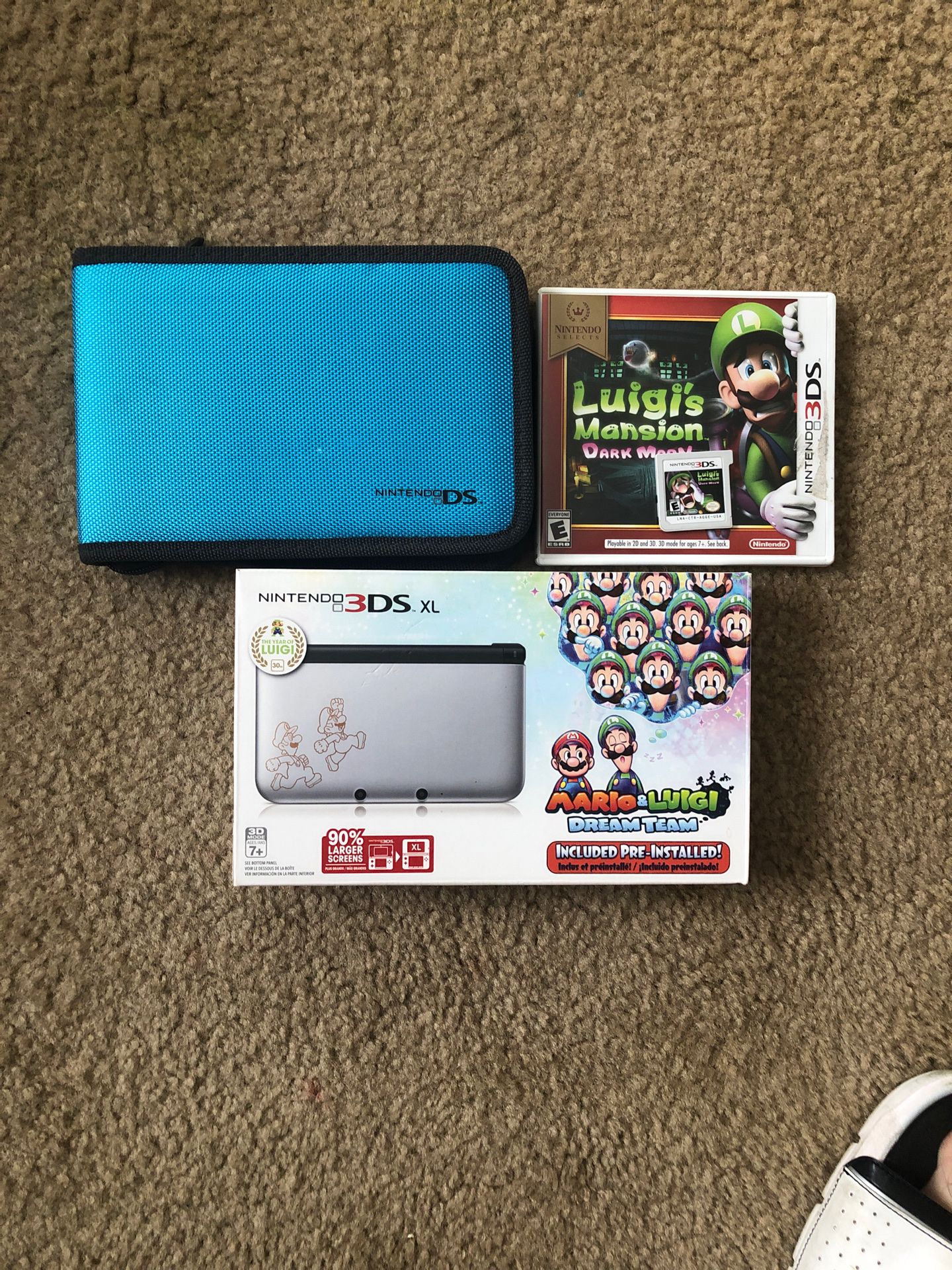 Nintendo 3DS xl with pre-installed Mario & Luigi dream team game.