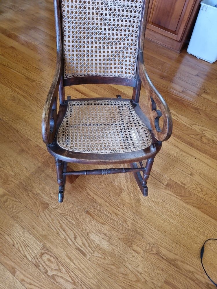 Vintage Lincoln Cane Rocking Chair