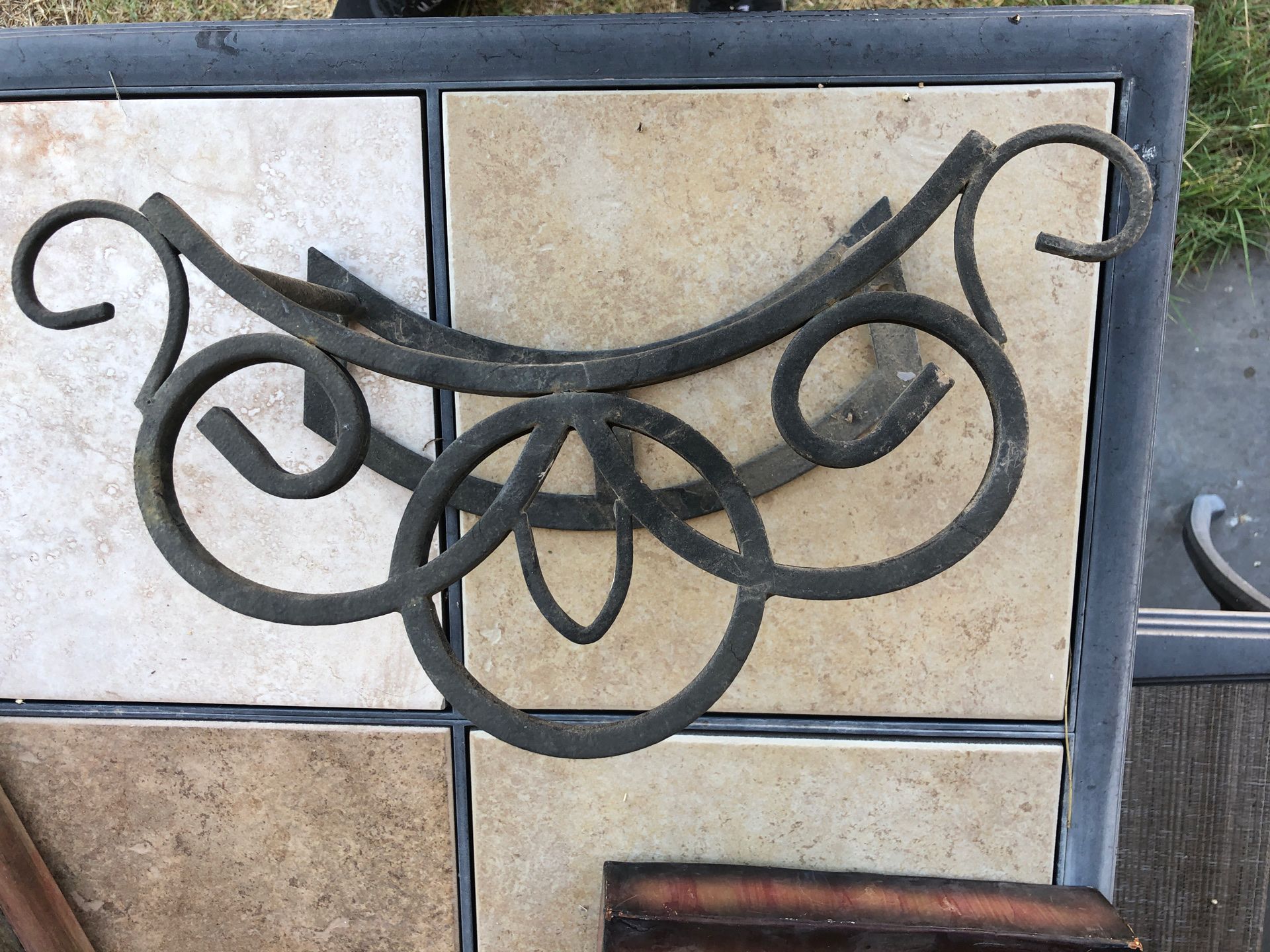 Wrought iron hose holder - outdoors garden hose holder