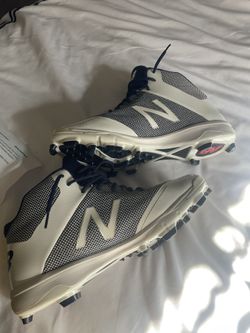 Used size 12 WIDE New Balance Cleats