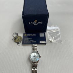 BREITLING A77320 WOMENS WATCH, COMES WITH BOX AND WARRANTY CARD