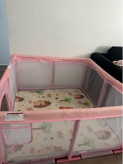 Pink baby playpen