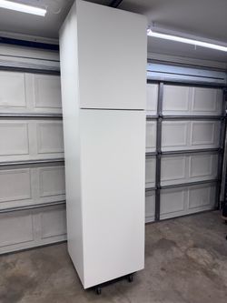 Ikea 7-1/2’FT tall Hanging Cabinet. Not floor sitting.