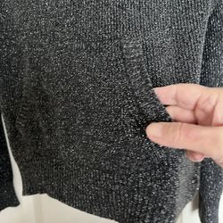 It’s Very Good Holiday Sweater In Size Medium. The Color Is Dark Gray With Sparkling On It. It’s For Women’s Made By NY& Company