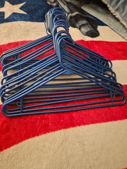 Ganchos azules para ropa en venta