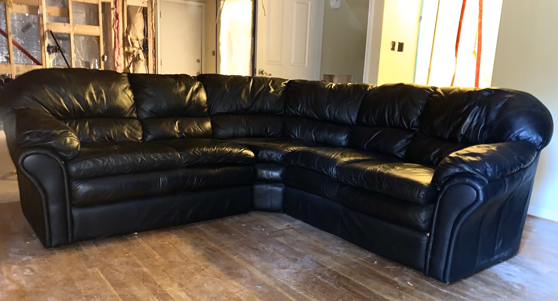 Black leather sectional sofa