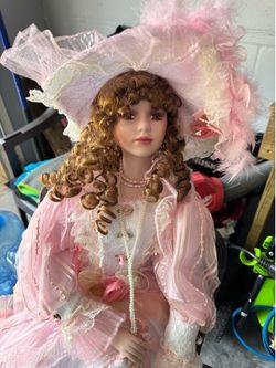Porcelain doll 3’ tall