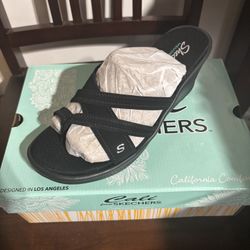 Sketchers Slip Ons