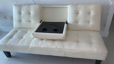 Near new white leather “like” futon. Just moved and no room for this H 32x W42