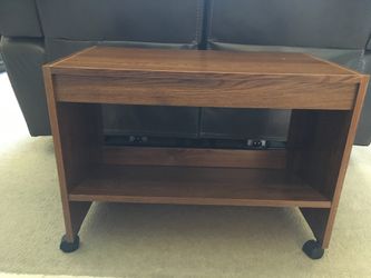 Small brown TV stand