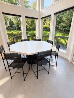 Octagonal Dining Table with 8 Black Chairs
