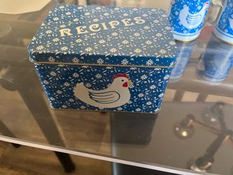 Salt/Pepper shakers with storage tins and recipe holder