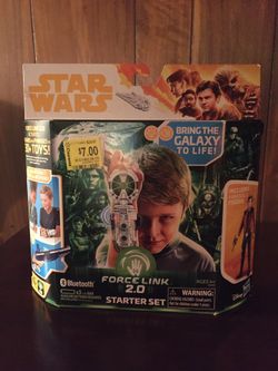 Star Wars Force Link 2.0 device and Han Solo figure