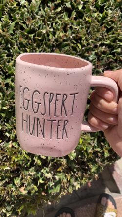 Rae Dunn Easter mug EGGSPERT HUNTER Pink with black wording   All Rae Dunn items are wrapped carefully to ensure safe arrival