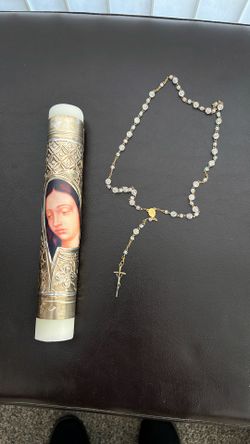 Guadalupe candle and rosary