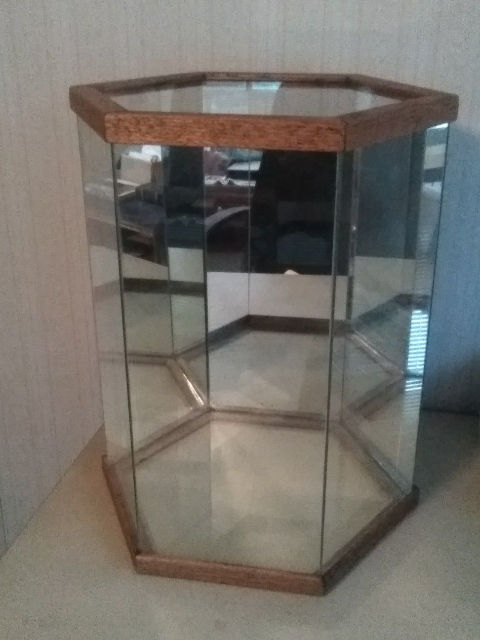 Hexagon Shaped Mirrored Glass Display Case.