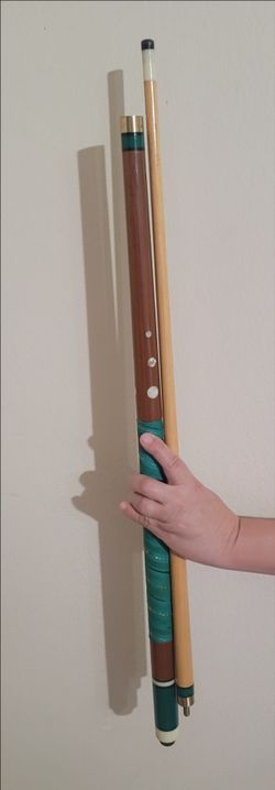 A Vintage Pool Cue, two-piece pool cue accompanied by leatherette carrying case