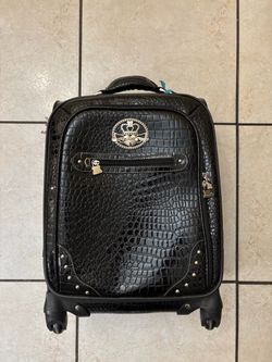 Kathy black carry in luggage