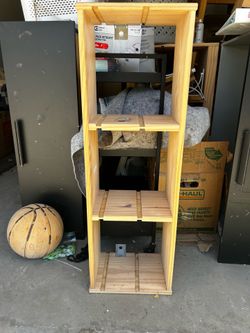 Hanging ikea shelf with bins