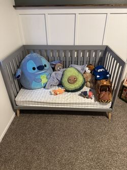 Delta Children Essex 4-in-1 Convertible Baby Crib, Grey with Natural Legs