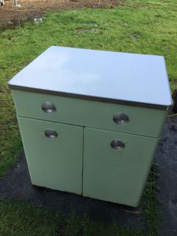 Antique metal cabinet mint green