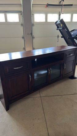 dark wood finish media console