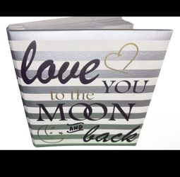 The TYM Slip-in Photo Album Family 'We Love You to the Moon and Back' in Steel Blue by HOMESENSE is a beautifully designed photo album perfect for sto