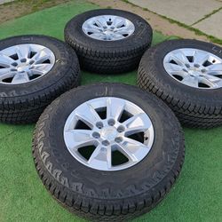 BRAND NEW CHEVY SILVERADO/ GMC SIERRA WHEELS WITH NEW BRIDGESTONE DUELER AT TIRES 265/70R17
