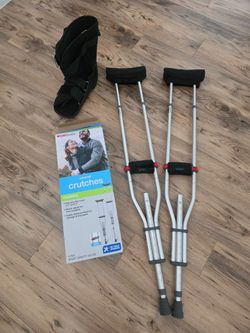 walking boot, and Crutches with pads