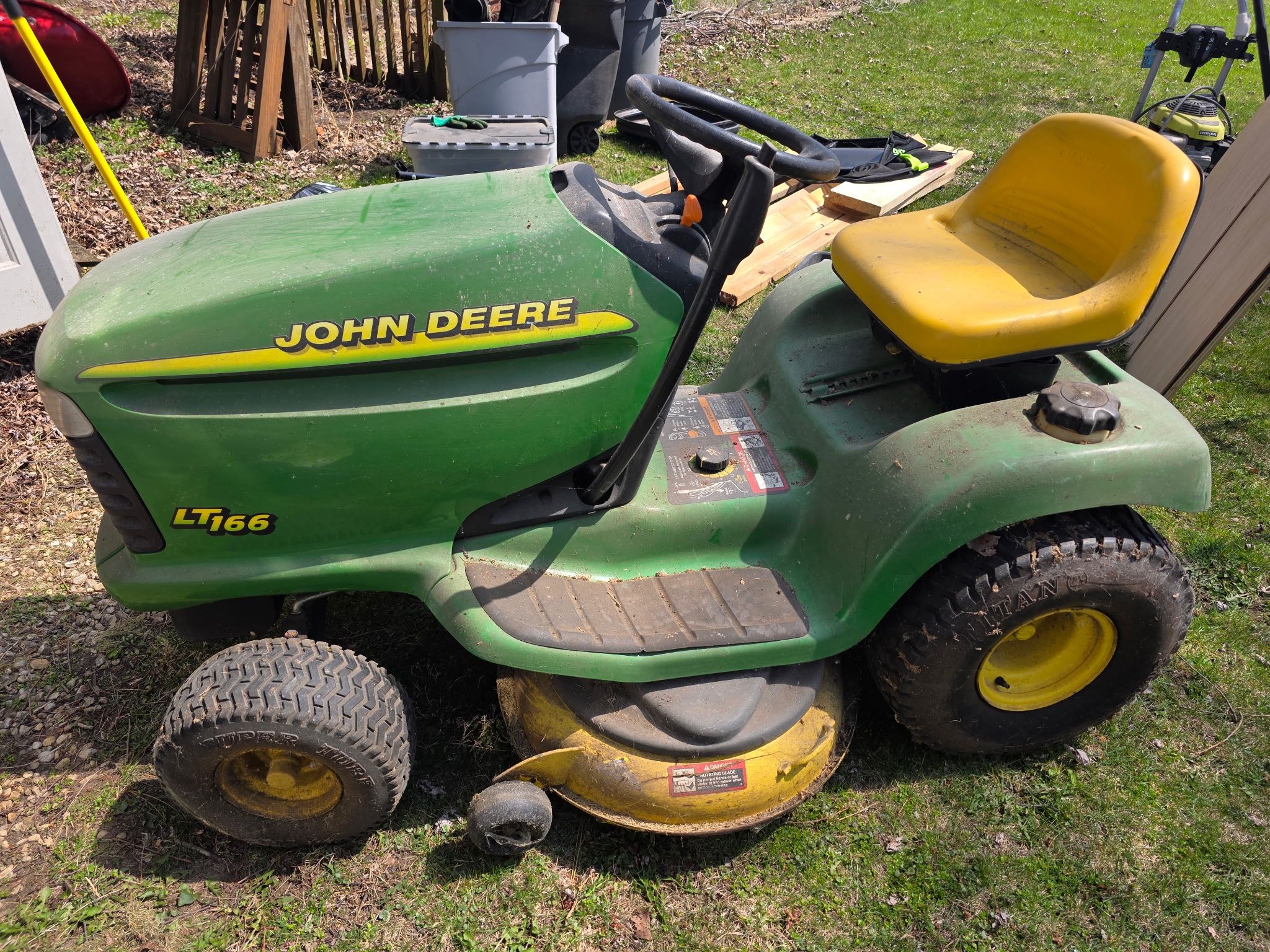 John Deere Riding Lawnmower ($1,000 OBO)