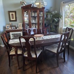 Mahogany Dinner Table With 6 Chairs And China Cabinet Included