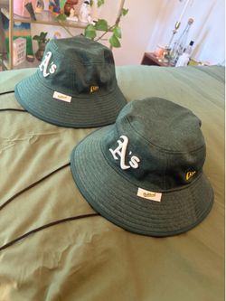 Two matching new era As bucket hats
