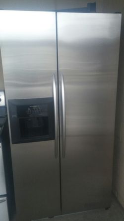 KitchenAid black and stainless side-by-side refrigerator