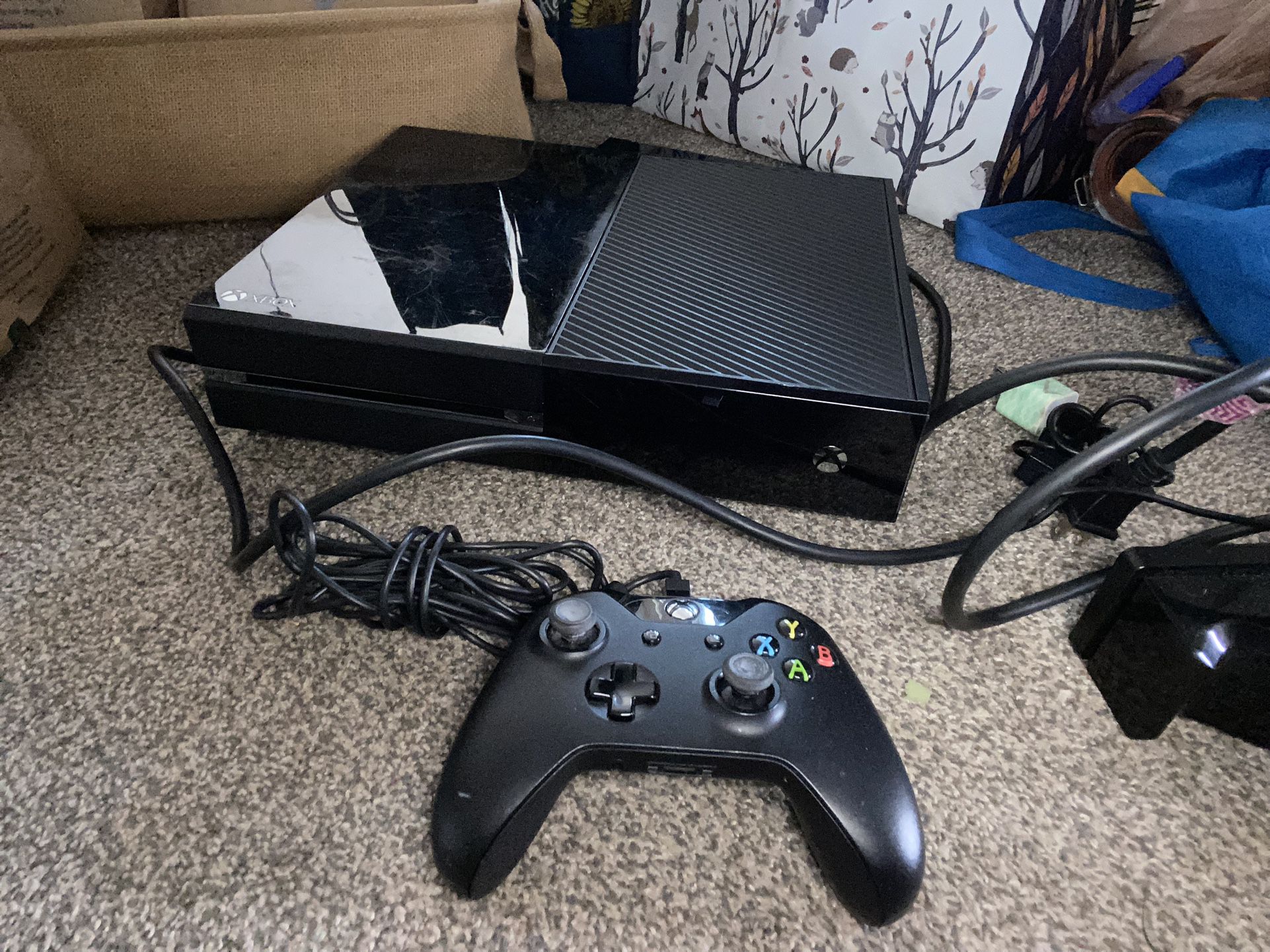 Black Xbox One And Two Controllers