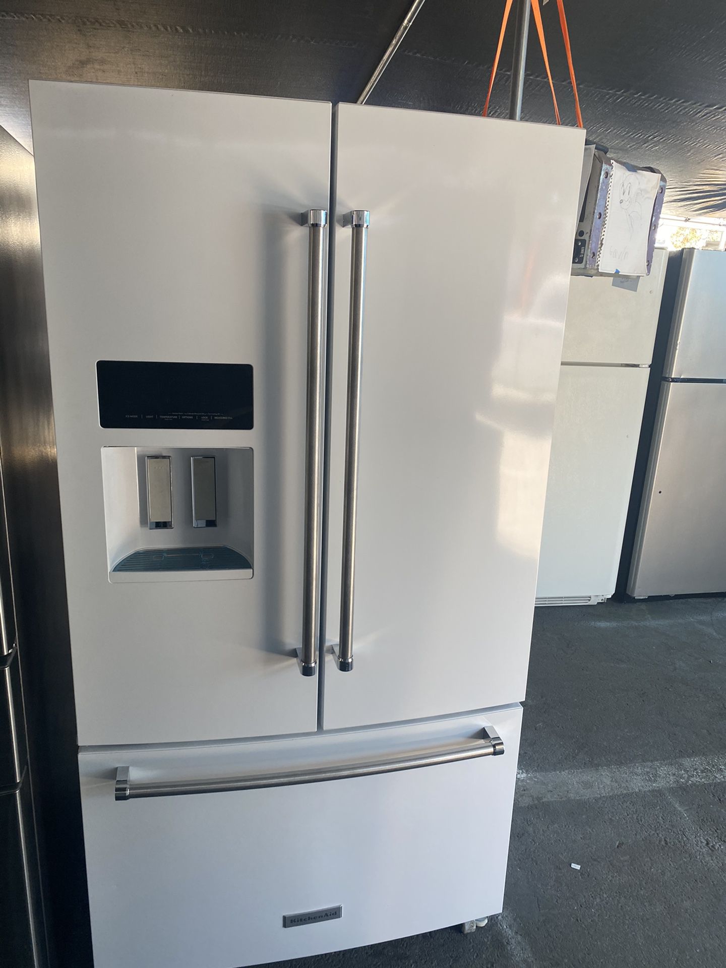 $699KitchenAid White French door refrigerator stainlessj handles includes delivery in the San Fernando Valley the ice water dispenser does not work
