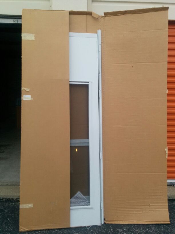 Andersen 3000 series Self storing storm door ( 34" x 84" , New )