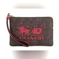 COACH Corner Zip Wristlet In Signature Canvas With Horse And Sleigh