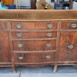 Antique Buffet / Dresser / Sideboard – Solid Wood – Needs RefinishingAntique buffet/dresser/sideboard with solid construction and great bones. This is