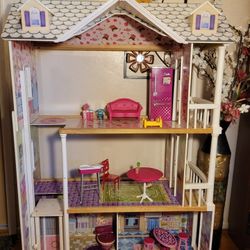 BEAUTIFUL  DOLL HOUSE. SOLID WOODEN, 15 ACCESSORIES WITH ELECTRONIC SOUND MAKING TOILET COMODE. BEST ACTIVITY FOR SUMMER BREAK. $45