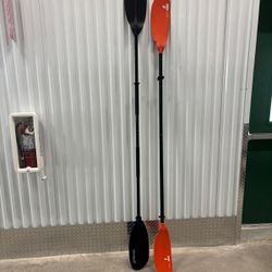 2-piece Tahe kayak paddle featuring orange blades and a black shaft. And Xtreme2  two piece black aluminum kayak paddle.. 96 “ and 92” $80 for both