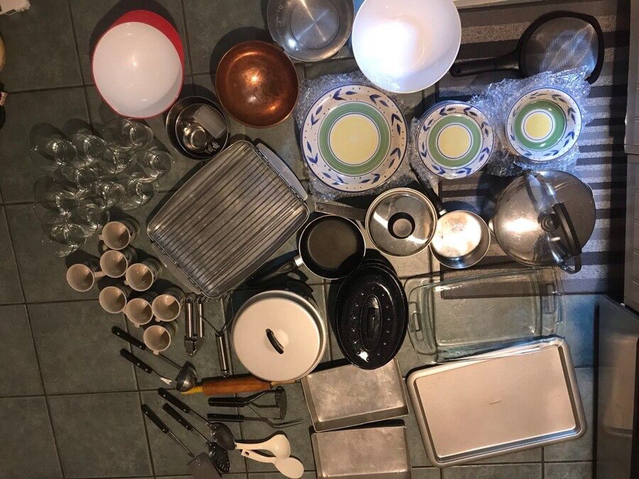Assorted kitchen and cooking items - bowls, plates, cups, glasses, baking sheets, cooking utensils